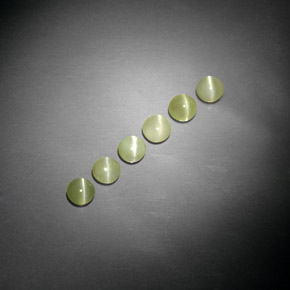 Натуральный зелёный chrysoberyl cat's eye  карата прозрачный, полупрозрачный