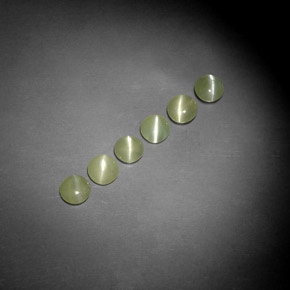 Натуральный зелёный chrysoberyl cat's eye  карата прозрачный, полупрозрачный