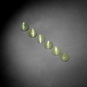 Натуральный зелёный chrysoberyl cat's eye  карата прозрачный, полупрозрачный
