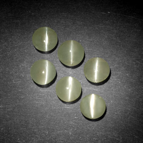 Натуральный зелёный chrysoberyl cat's eye  карата прозрачный, полупрозрачный