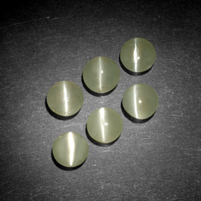Натуральный зелёный chrysoberyl cat's eye  карата прозрачный, полупрозрачный