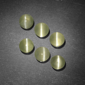 Натуральный зелёный chrysoberyl cat's eye  карата прозрачный, полупрозрачный