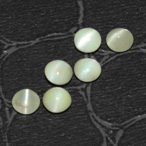 Натуральный зелёный chrysoberyl cat's eye 2,03 карата огранка круг, полупрозрачный