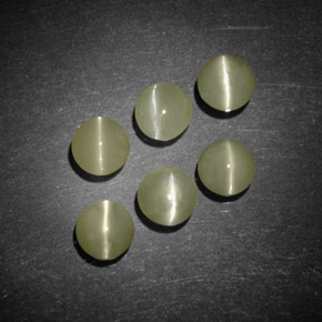 Натуральный зелёный chrysoberyl cat's eye  карата прозрачный, полупрозрачный