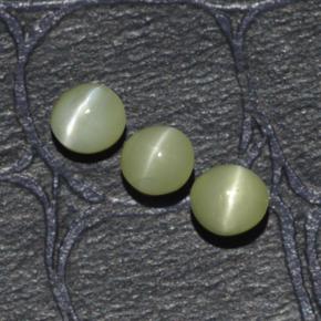 Натуральный зелёный chrysoberyl cat's eye 1,15 карата огранка круг, полупрозрачный