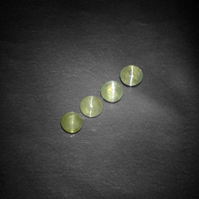 Натуральный зелёный chrysoberyl cat's eye  карата прозрачный, полупрозрачный