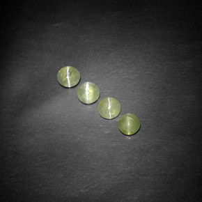Натуральный зелёный chrysoberyl cat's eye  карата прозрачный, полупрозрачный