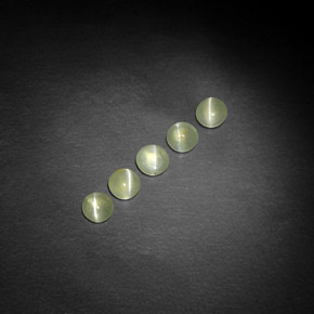 Натуральный зелёный chrysoberyl cat's eye  карата прозрачный, полупрозрачный