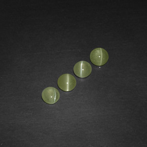 Натуральный зелёный chrysoberyl cat's eye  карата прозрачный, полупрозрачный