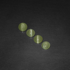 Натуральный зелёный chrysoberyl cat's eye  карата прозрачный, полупрозрачный