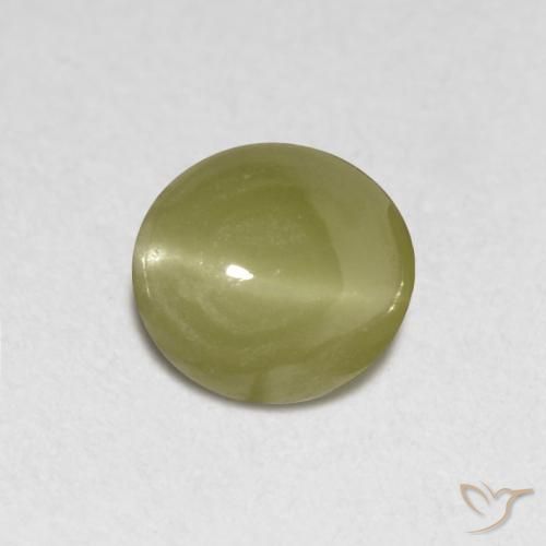 Натуральный жёлтый chrysoberyl cat's eye 0,40 карата огранка овал, полупрозрачный