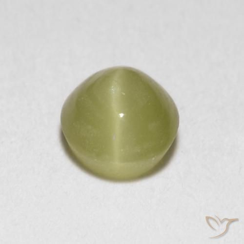 Натуральный жёлтый chrysoberyl cat's eye 0,40 карата огранка овал, полупрозрачный