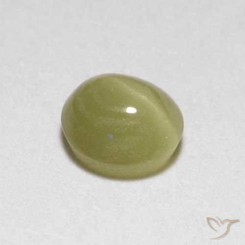 Натуральный жёлтый chrysoberyl cat's eye 0,40 карата огранка овал, полупрозрачный