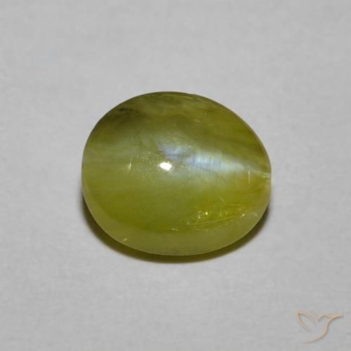 Натуральный зелёный chrysoberyl cat's eye 1,21 карата огранка овал, полупрозрачный