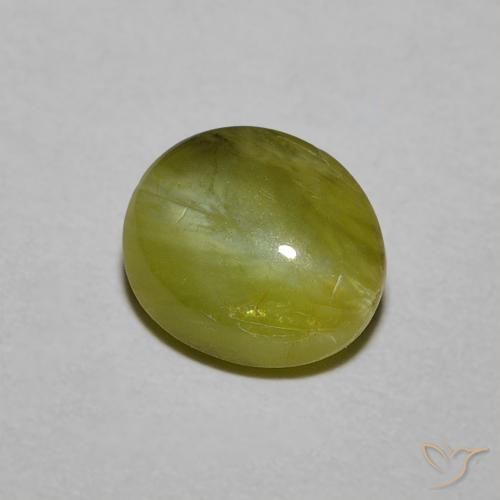 Натуральный зелёный chrysoberyl cat's eye 1,21 карата огранка овал, полупрозрачный