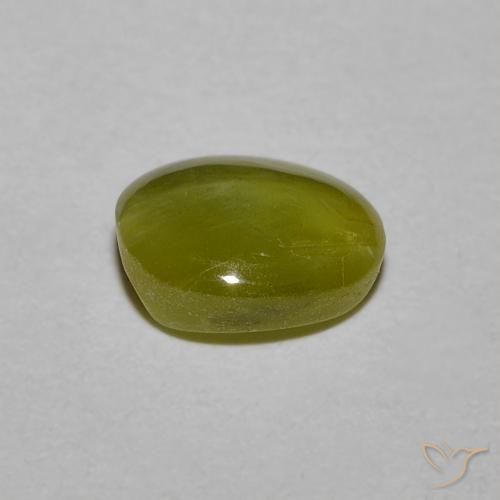 Натуральный зелёный chrysoberyl cat's eye 1,21 карата огранка овал, полупрозрачный