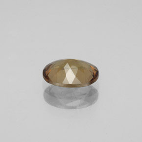 1.55 карата, натуральный Золотисто-коричневый с переходом в оранжевый Меняющий цвет гранат, Огранка Овал, Чистота VS