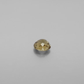 0.51 карата, натуральный Золотисто-коричневый с переходом в оранжевый Меняющий цвет гранат, Огранка Круг, Чистота VS