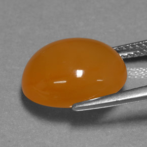 6.07 карата, натуральный Оранжевый Огненный опал, Огранка Овал, Полупрозрачный