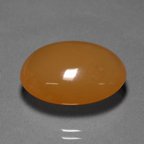 Натуральный оранжевый огненный опал 12,70 карата огранка овал, полупрозрачный