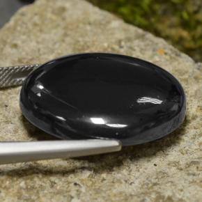 Натуральный темно-серый гематит 57,22 карата огранка круг, непрозрачный