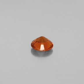 Натуральный оранжевый гессонит 0,71 карата огранка круг, VS-SI