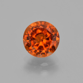Натуральный оранжевый гессонит 1,57 карата огранка круг, VS-SI