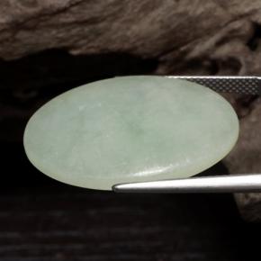 22.56 карата, натуральный Зеленовато-белый Жадеит, Огранка Овал, Полупрозрачный