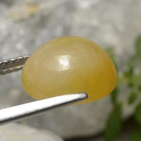 7.08 карата, натуральный Желто-золотистый Жадеит, Огранка Овал, Полупрозрачный