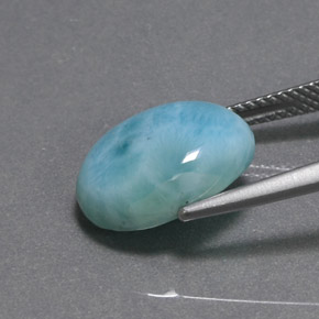 Натуральный зелёный ларимар 6,54 карата огранка овал, непрозрачный
