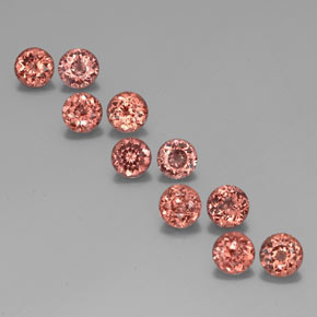 Натуральный оранжевый малайский гранат 6,08 карата огранка круг, чистота VS