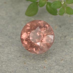 Натуральный розовый малайский гранат 0,58 карата огранка круг, чистота VS