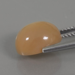 4.49 карата, натуральный Золотой апельсиновый крем Лунный Камень, Огранка Овал, Прозрачный