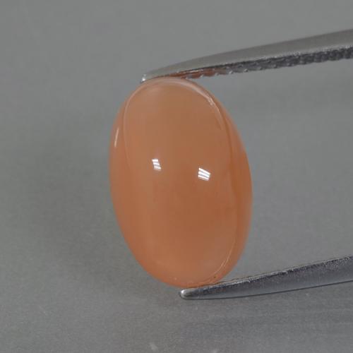 4.42 карата, натуральный Перскиково-оранжевый Лунный Камень, Огранка Овал, Полупрозрачный