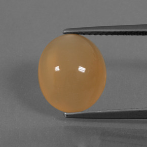 4.60 карата, натуральный Средне-светло-оранжевый Лунный Камень, Огранка Овал, Полупрозрачный