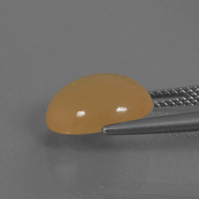 4.60 карата, натуральный Средне-светло-оранжевый Лунный Камень, Огранка Овал, Полупрозрачный