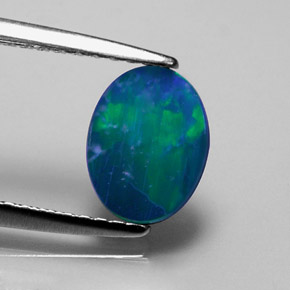 0.73 карата, натуральный Многоцветный Опаловый дублет, Огранка Овал, Непрозрачный