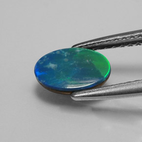 0.73 карата, натуральный Многоцветный Опаловый дублет, Огранка Овал, Непрозрачный