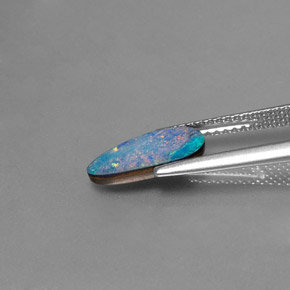 Натуральный многоцветный опаловый дублет 1,26 карата необычная форма, непрозрачный