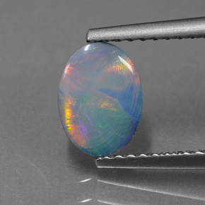 0.69 карата, натуральный Многоцветный Опаловый дублет, Овал, Непрозрачный