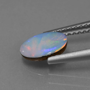 0.69 карата, натуральный Многоцветный Опаловый дублет, Овал, Непрозрачный