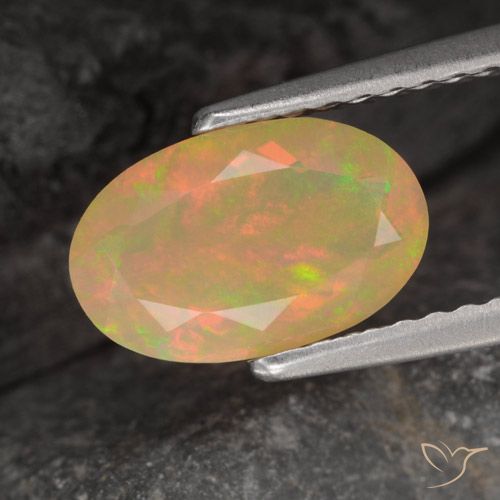 0.86ct Натуральный Многоцветный Опал, Овал, Полупрозрачный