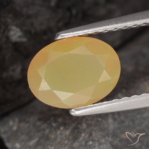 0.87ct Натуральный Многоцветный Опал, Овал, Полупрозрачный