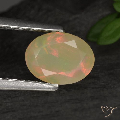 0.79ct Натуральный Многоцветный Опал, Овал, Полупрозрачный