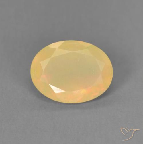 0.76ct Натуральный Многоцветный Опал, Овал, Полупрозрачный