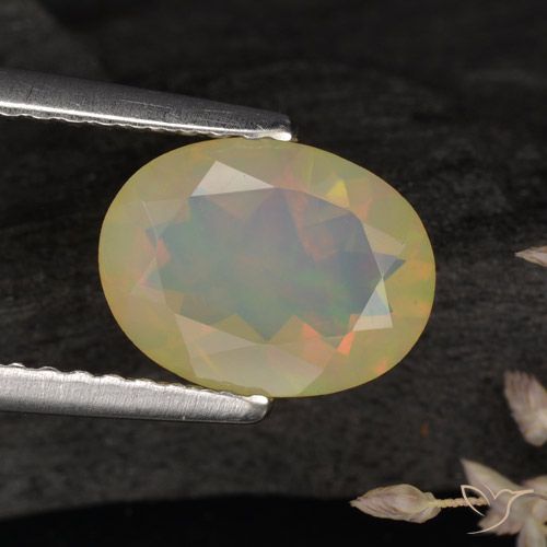 0.96ct Натуральный Многоцветный Опал, Овал, Полупрозрачный