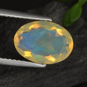 Натуральный жёлтый опал 1,65 карата огранка овал, прозрачный