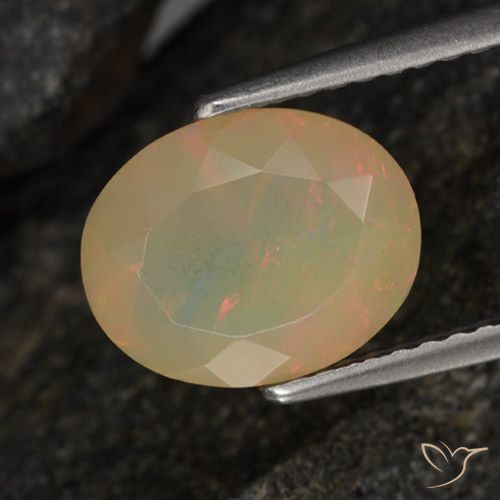 1.45ct Натуральный Многоцветный Опал, Овал, Полупрозрачный