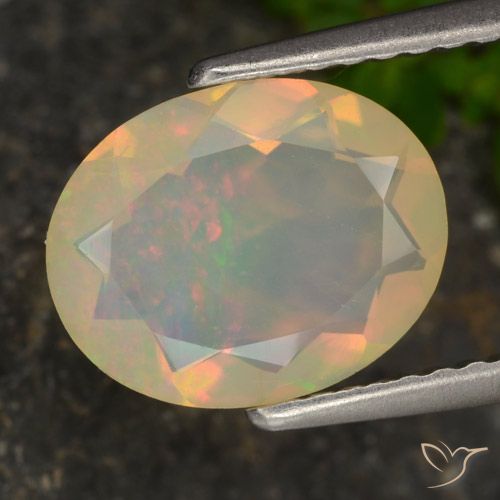 1.27ct Натуральный Многоцветный Опал, Овал, Полупрозрачный