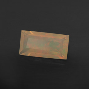 Натуральный многоцветный опал 1,55 карата прозрачный, полупрозрачный